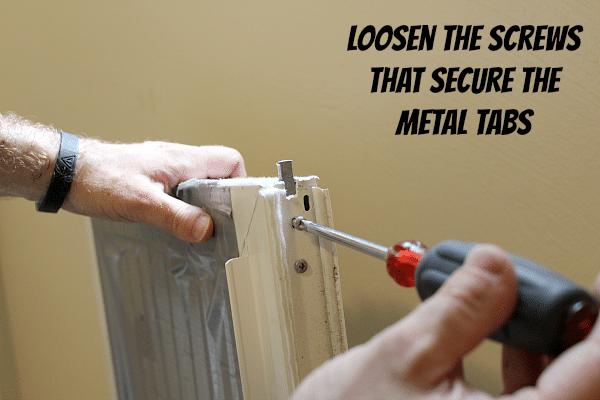 Loosen Metal Tab Screws