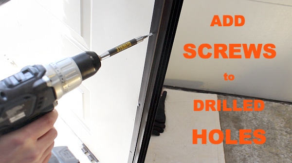 Add screws to drilled holes