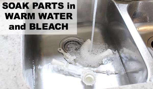 Soak parts in warm water and bleach