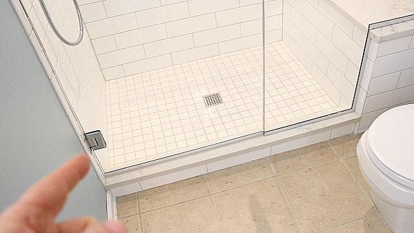 What is a frameless shower door