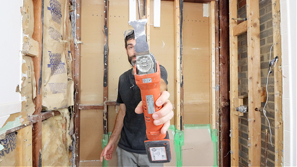 Use oscillating multitools to score drywall 