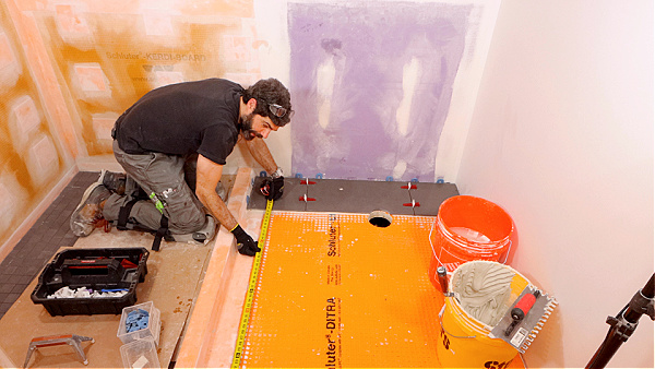 Inspecting Tile Floor