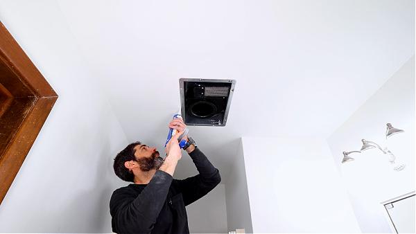 Siliconing Panasonic Fan Body to Ceiling