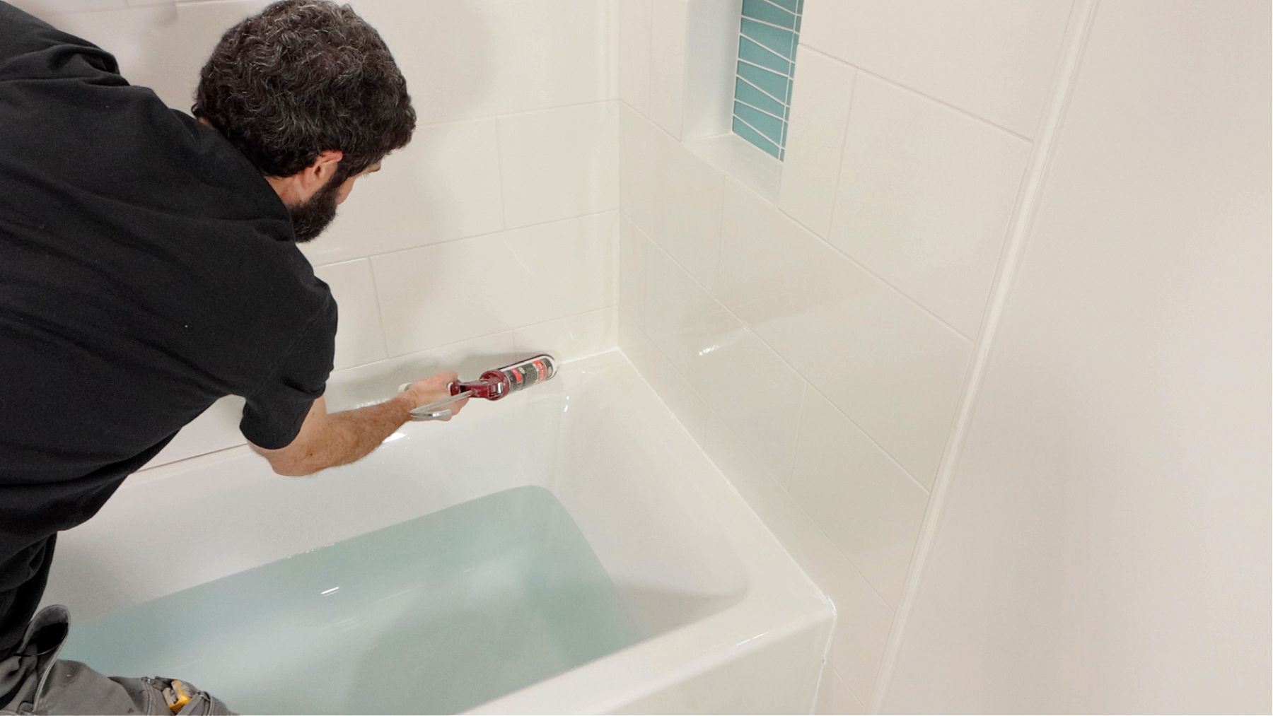 Siliconing Bathtub to Tile Shower Wall